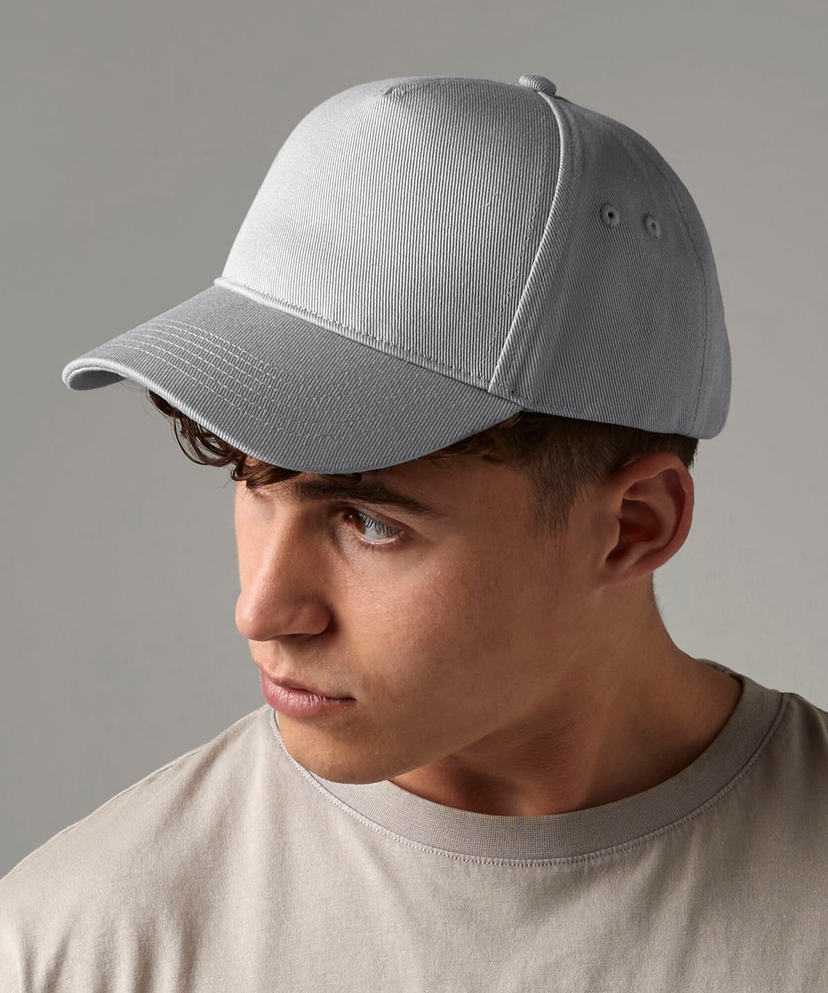 Ultimate 5-Panel Cap shown in use